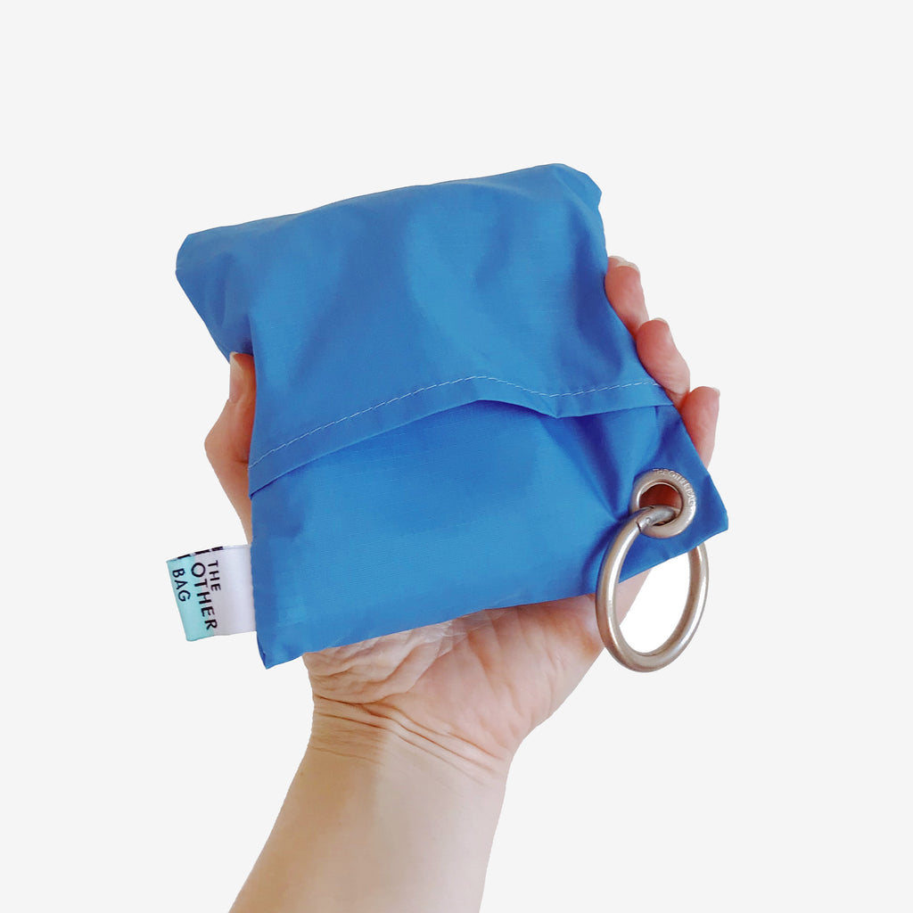 Bondi blue foldable tote bag made with Econyl® regenerated yarn