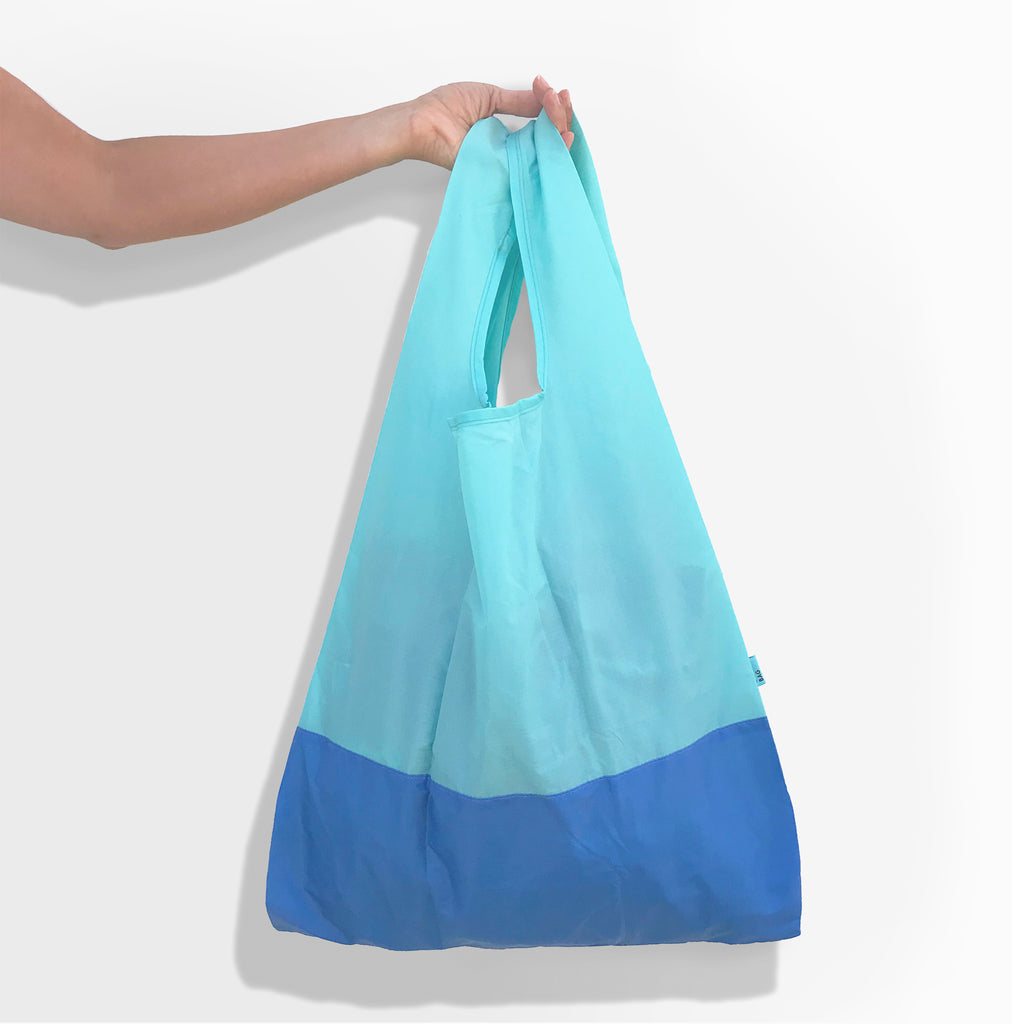 Aqua and Bondi blue foldable tote bag  made with Econyl® regenerated yarn