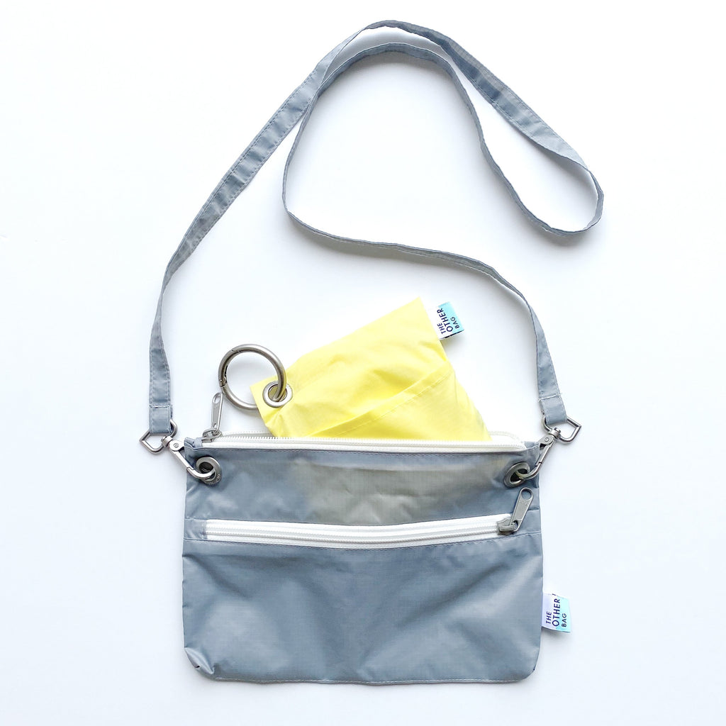 Econyl crossbody bag and econyl foldable tote bundle grey and yellow